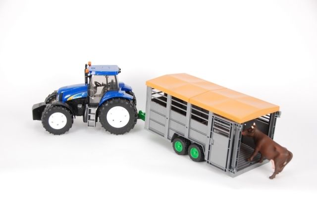 Bruder 1695 Traktor New Holland T8040 s přívěsem na přepravu dobytka a figurkou krávy - obrázek 1