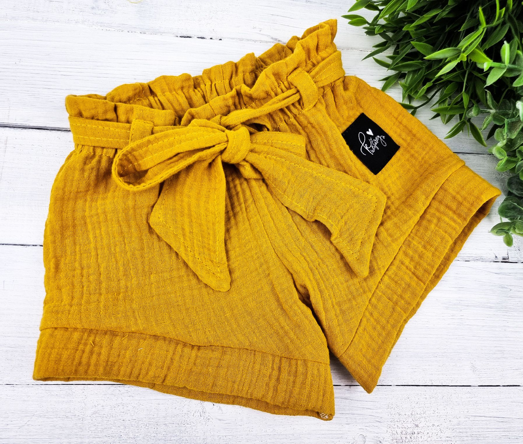 Kulišárny (handmade) Šortky s mašlí ,,MUSTARD,, mušelín vel.74 sklad š VELIKOST: 74 - obrázek 1